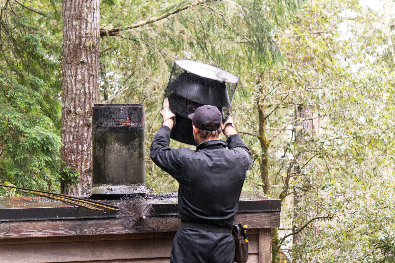 Chimney sweep cleaning chimney in Portsmouth, NH